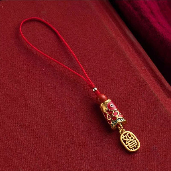 Koi Fish Cinnabar Ruyi Phone Charm – top view of cinnabar koi fish charm with ruyi cloud, glossy red surface