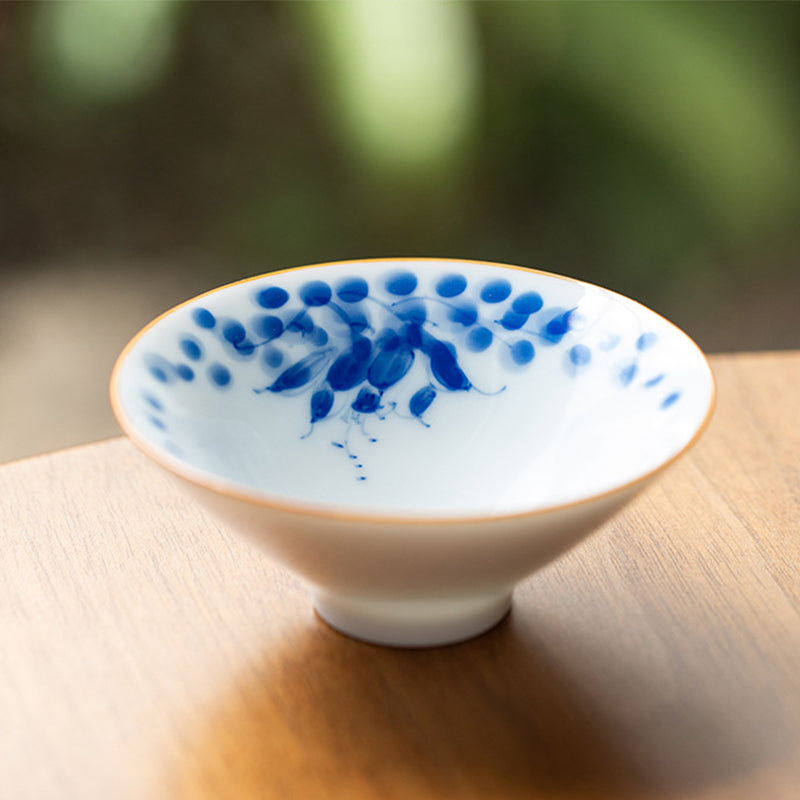 Mandala Koi Teacup – Studio shot with soft lighting highlighting koi fish colors