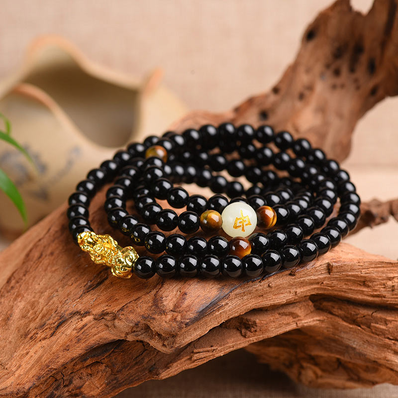 Zodiac Obsidian PiXiu Mala – Multi-wrap black beads with gold PiXiu, tiger eye on wood