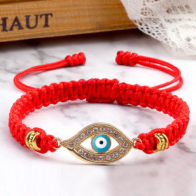 Red cord evil eye bracelet with gold turquoise evil eye crystal charm, marble styling