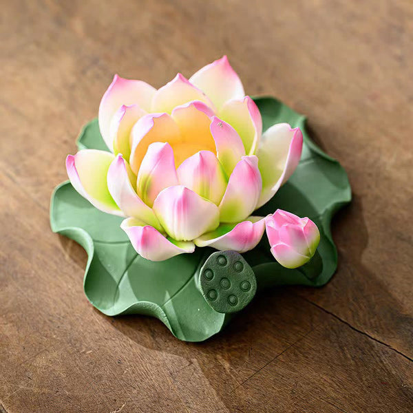Lotus Ceramic Incense Burner - close-up of pink lotus with bud and seed pod on green leaf, artisan craft