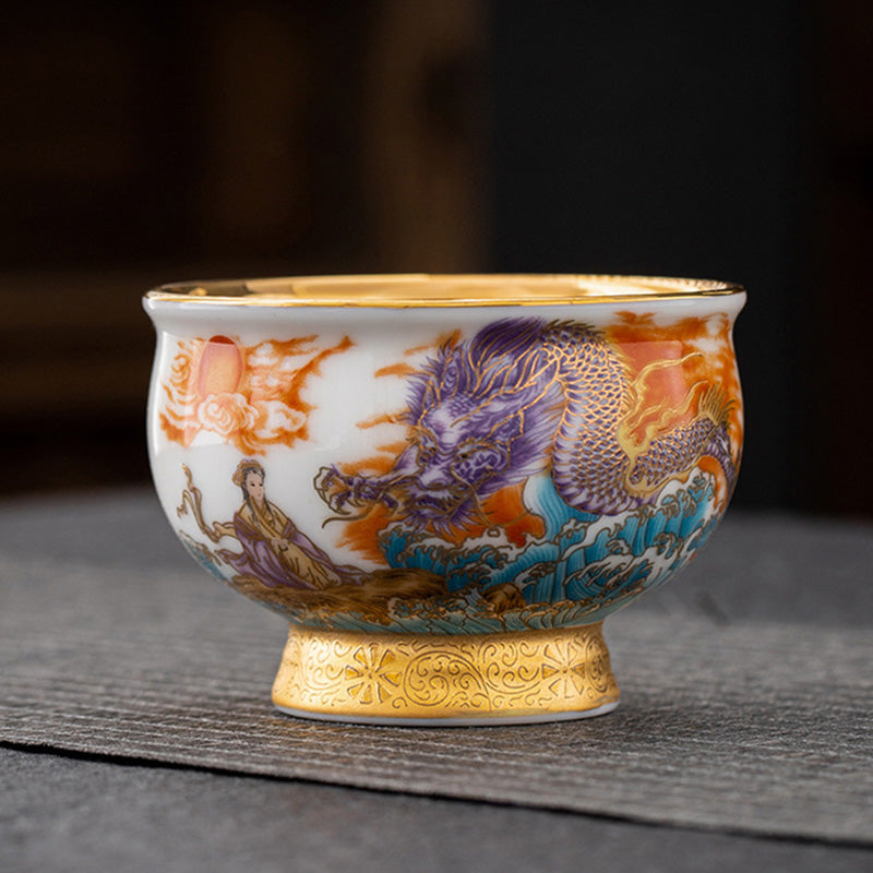 Golden Eagle Dragon Gilt Ceramic Teacup – purple dragon with turquoise waves and gold pedestal base, three-quarter view, luxury