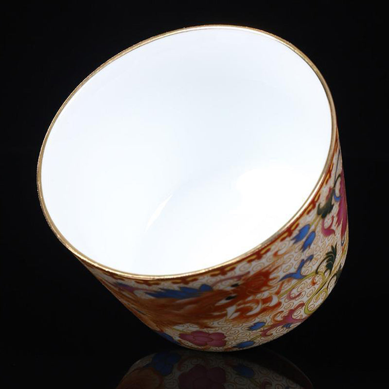 2Pcs Dragon Phoenix Ceramic Teacup Set - Top-down view revealing white interior and ornate exterior, artisanal