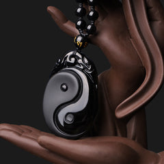 Black Obsidian Yin Yang Pendant Necklace – Obsidian Yin-Yang pendant on Buddha hand stand, beaded amulet necklace