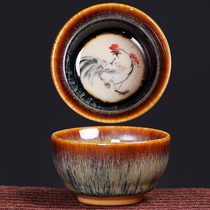 12 Zodiac Jian Zhan Teacup - Pig zodiac reclining pig painting, russet-to-charcoal hare fur glaze exterior