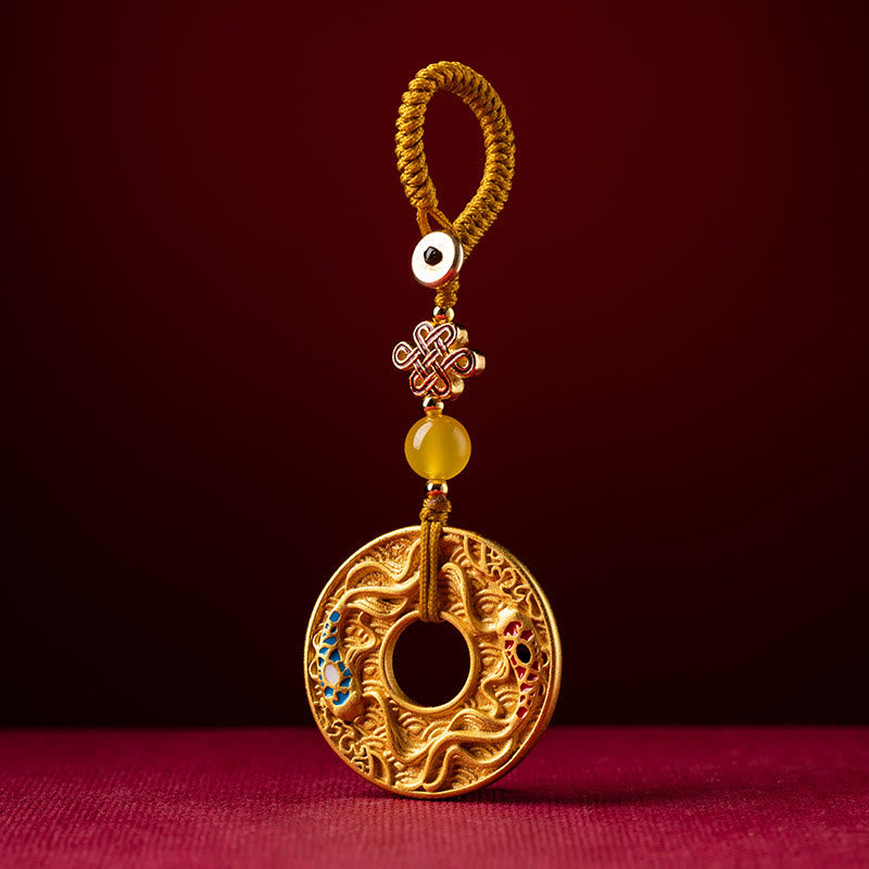 Double Koi Key Ring - natural light product shot on dark background, wealth amulet