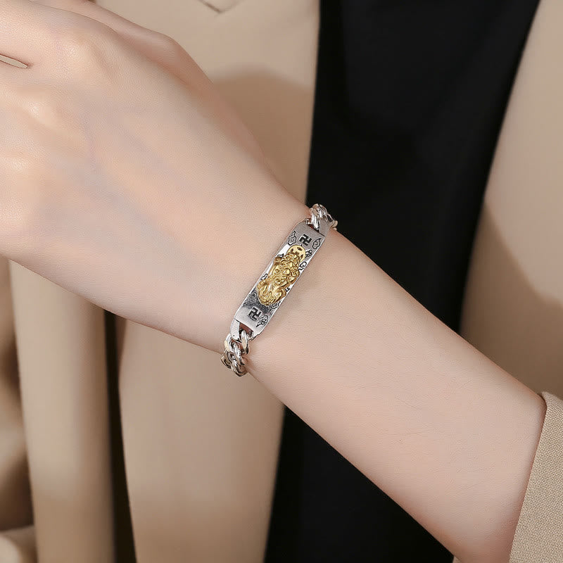Om Mani Padme Hum PiXiu Swastika Wisdom Bracelet – silver bracelet worn on woman's wrist with beige coat, elegant