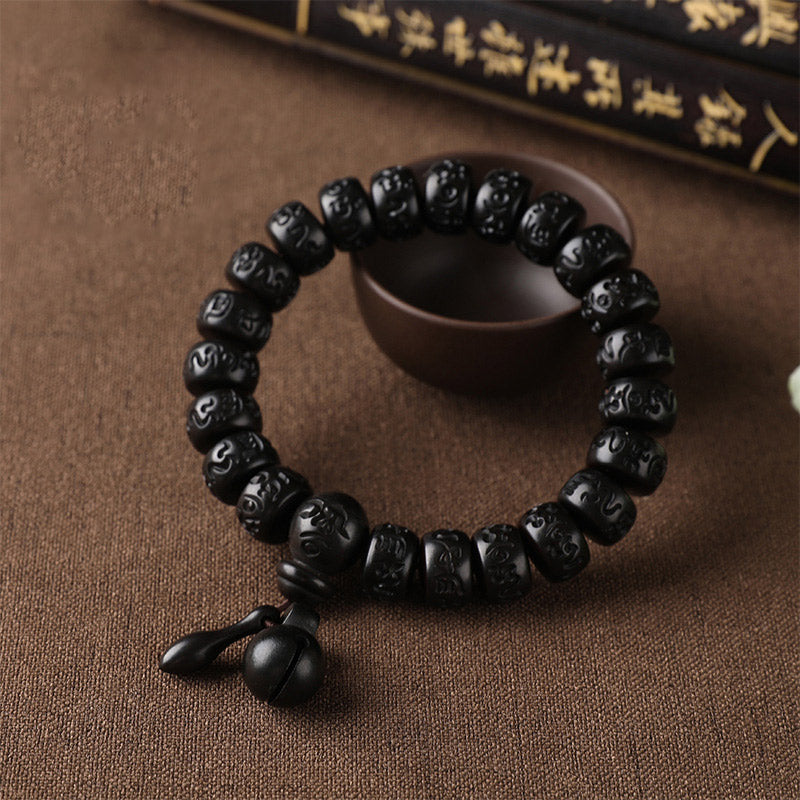 Lightning Strike Wood Bracelet – Black wood bead bracelet with carved patterns on linen, Tibetan wrist mala