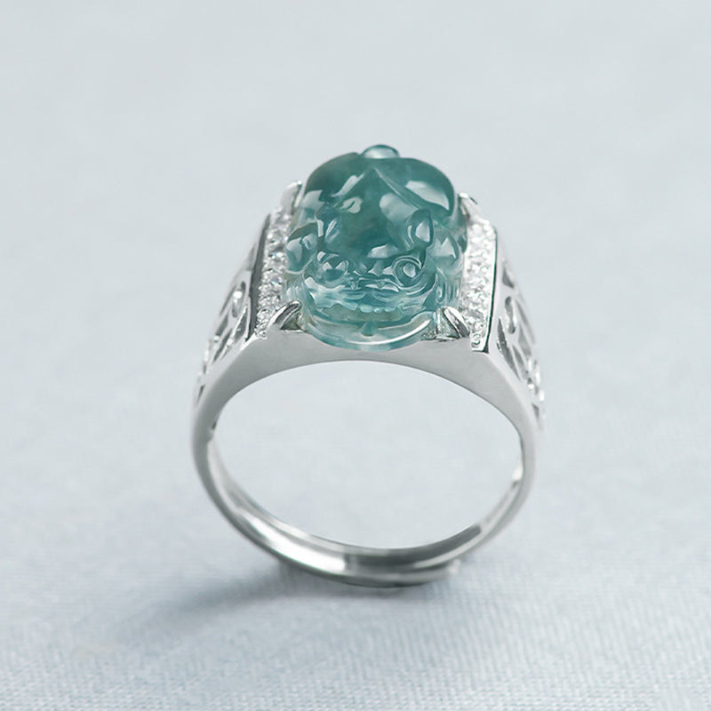 925 Sterling Silver Jade PiXiu Luck Ring – Icy jade PiXiu ring on light blue fabric, detailed craft shot