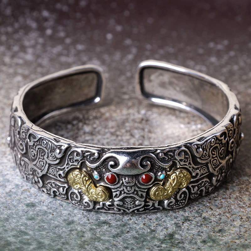 PiXiu Engraved Blessing Bracelet Bangle – front view PiXiu face silver cuff with red eyes and gold horns on stone