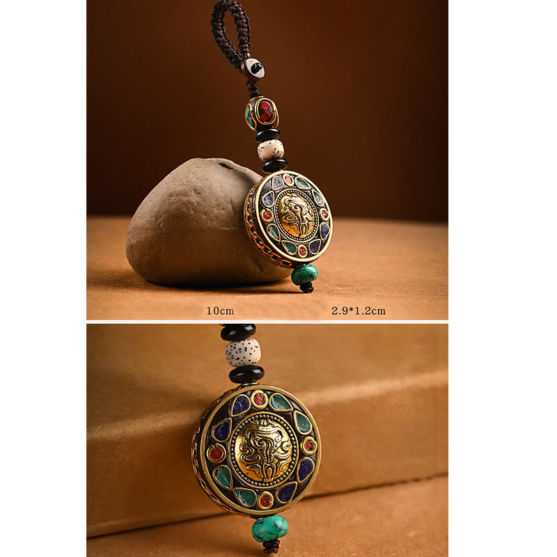 Tibetan Bodhi Seed Peace Key Chain – Brass medallion with mythical creature relief, turquoise coral inlay, ethnic pendant