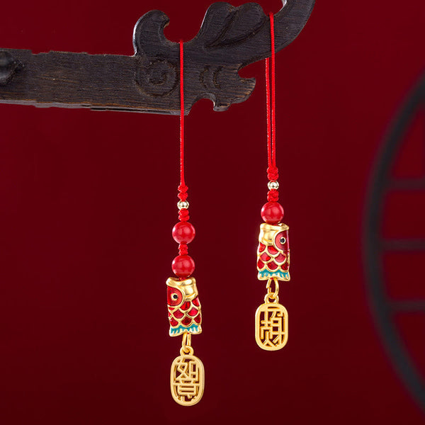 Koi Fish Cinnabar Ruyi Phone Charm – front view of red cinnabar koi with gold ruyi scepter tassel, wealth phone decor