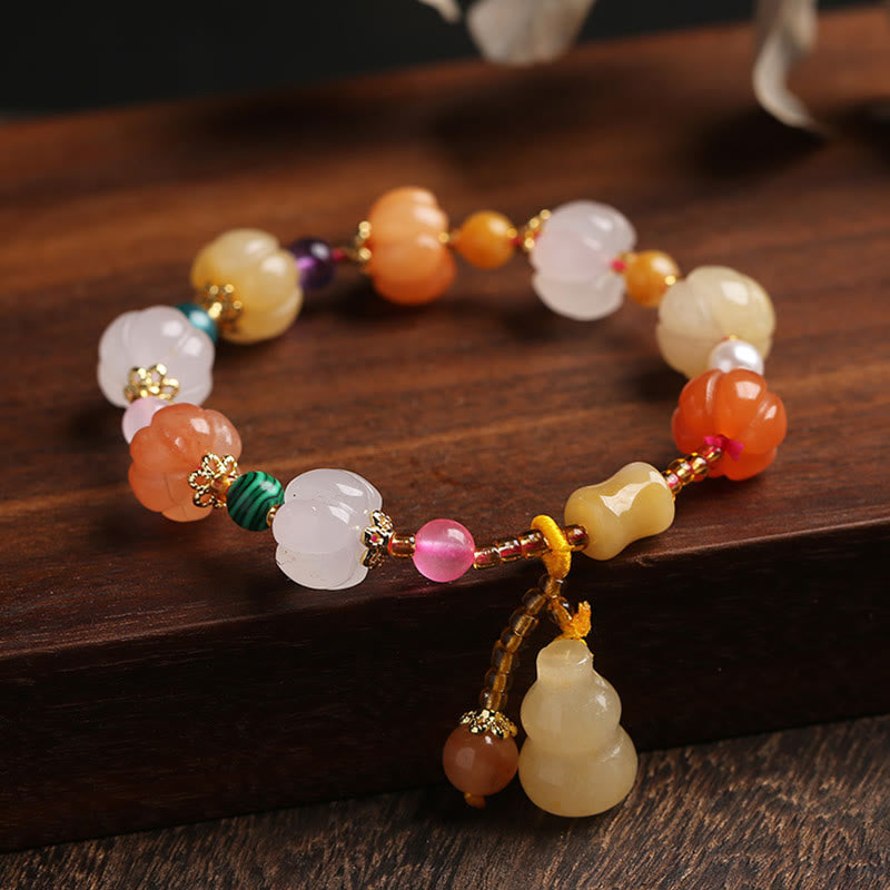 Golden Silk Jade Gourd Bracelet – Multi-color jade pumpkin beads with gourd on wood