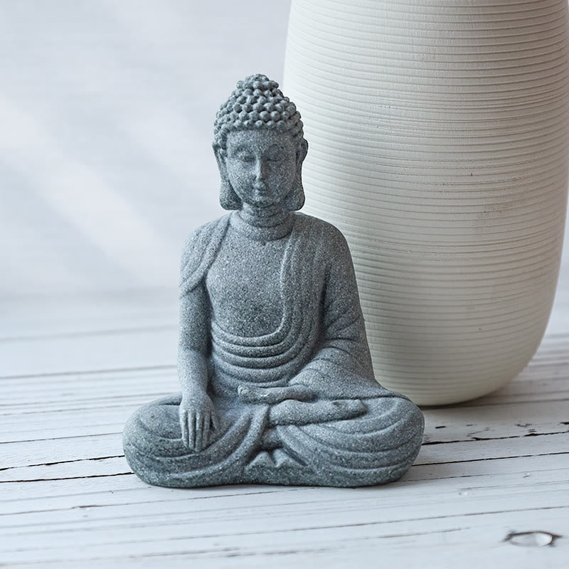 Tibetan Singing Bowl Gift Bundle – Gray stone Buddha statue on white wood surface, zen decor