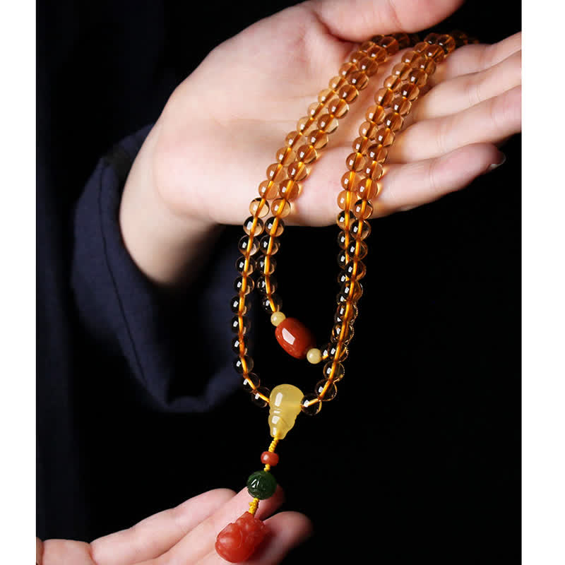 Citrine Mala Bracelet – Close-up of amber guru bead, green jade and red coral PiXiu charm
