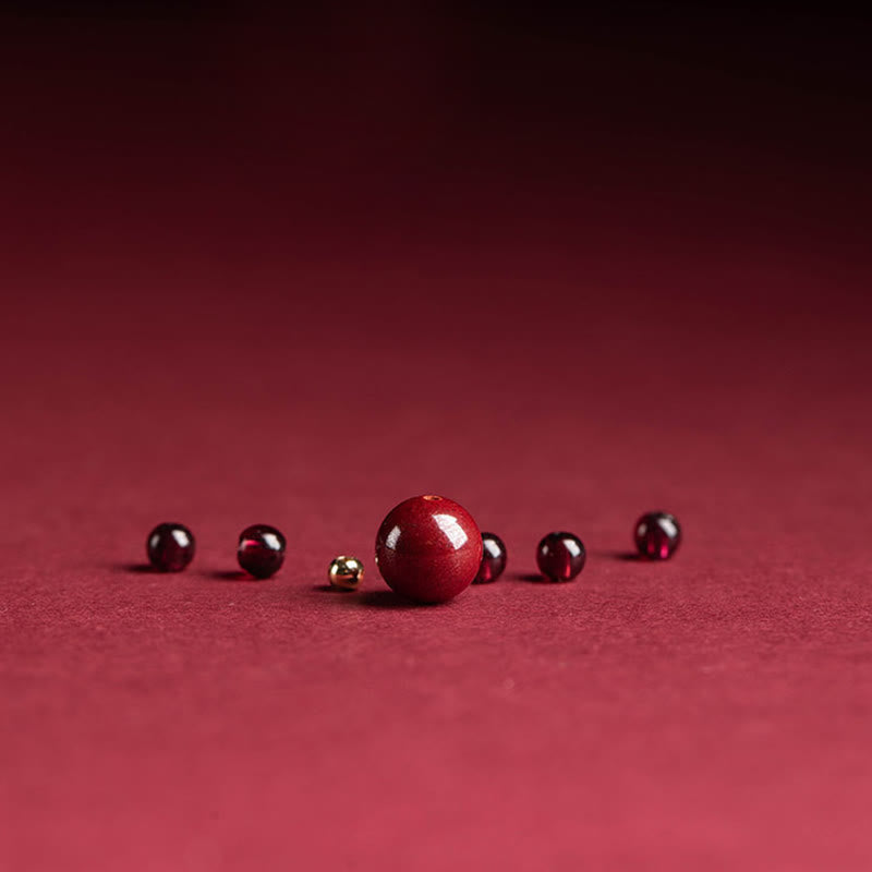 Garnet Cinnabar Ring – loose cinnabar garnet beads arrangement red background, raw material