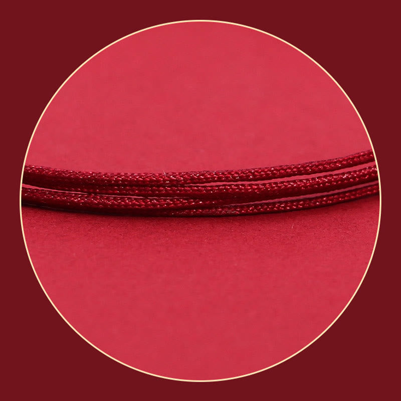 Silver PiXiu Strawberry Quartz Bracelet – Close-up red braided cord texture detail