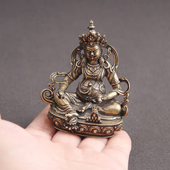 Yellow Jambhala Copper Buddha Statue – full string length display, Buddhist garden banner