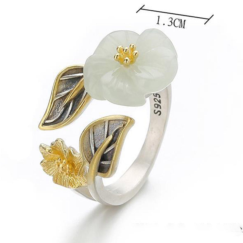 White Jade Plum Blossom Silver Ring - Open adjustable ring with S925 sterling silver stamp, 1.3cm jade flower, gold-plated stamen, and oxidized leaf details