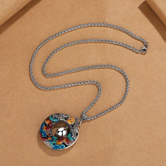 Double Dragon Copper Necklace – Circular dragon koi pendant flat lay, colorful enamel on oxidized silver, wheat chain