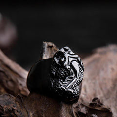 FengShui PiXiu Strength Ring – Glossy black obsidian pixiu ring on driftwood, strength amulet