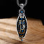 Nine-Eye Dzi Bead Pendant - Angled view of silver-framed bead with gold inlay and turquoise