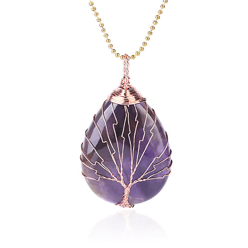 Quartz Crystal Tree of Life Necklace – amethyst pendant with reflection, rose gold wire, white background