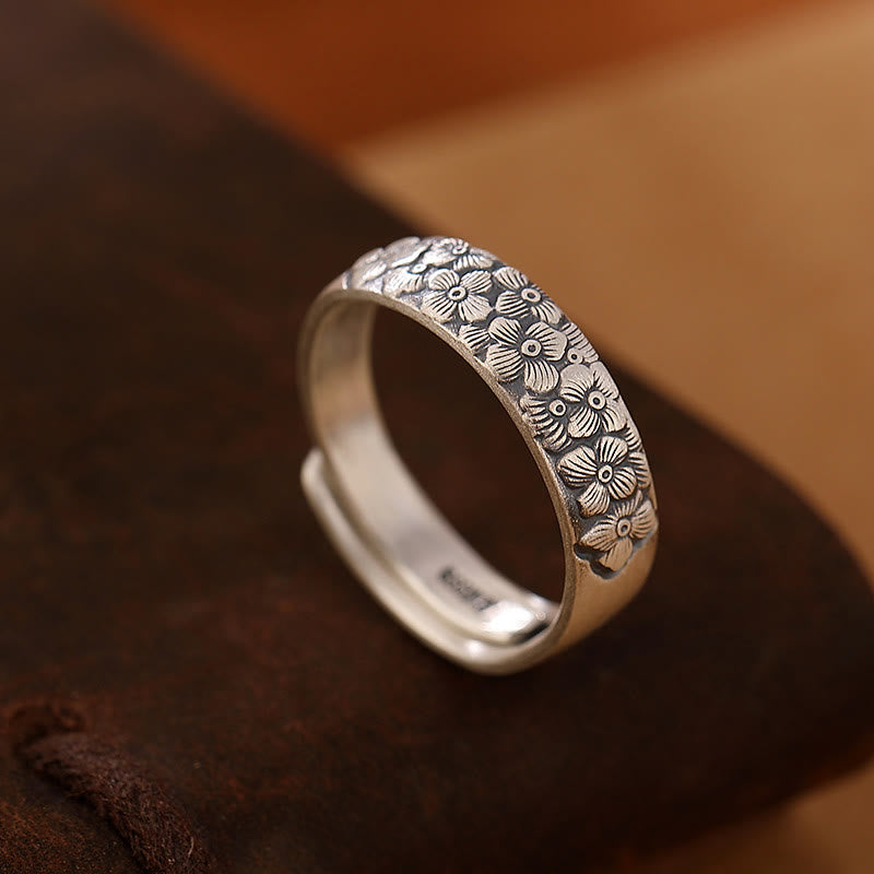 Anillo ajustable de flor de loto y ciruelo "Iluminación" de plata 999