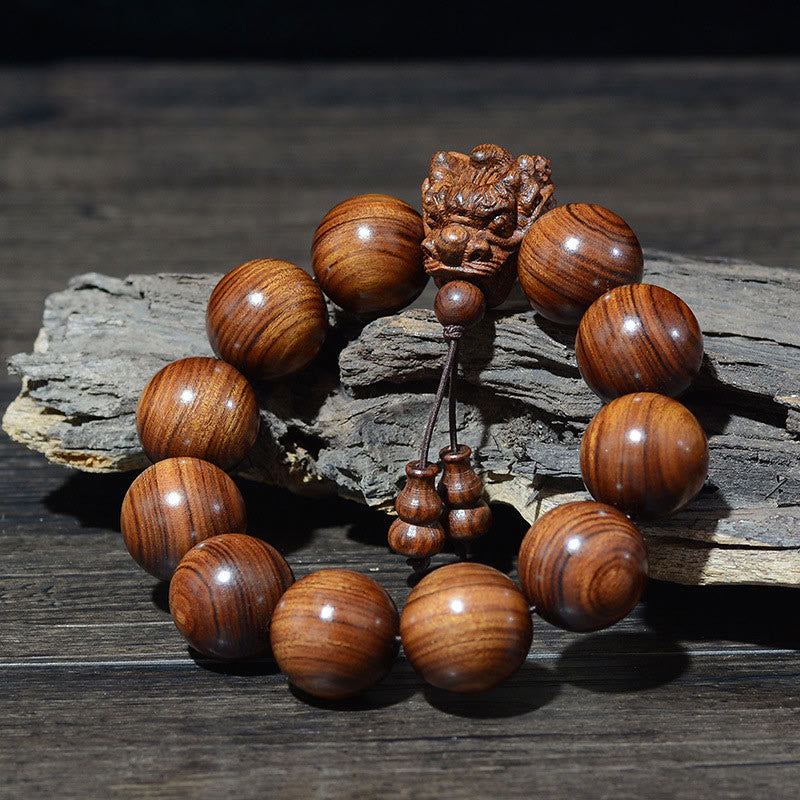 Multi-Wood Dragon Bracelet - Polished brown beads with guardian lion on rustic wood, Courage