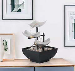 Three Layers Lotus Waterfall Fountain - Silver tiers on wood table with framed art, Zen