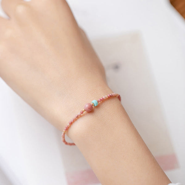 Rhodonite Loving Energy Bracelet – Pink stone bracelet with gold lobster clasp, rose focal and turquoise accent in composite with macro detail insets