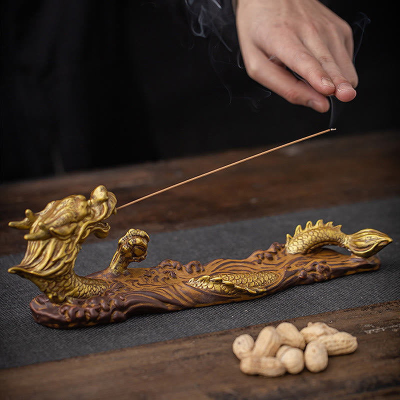 Dragon Protection Incense Burner – on tea table with white porcelain cups, smoke rising, harmony lifestyle