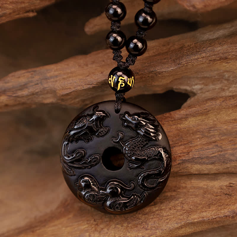Black Obsidian Dragon Phoenix Pendant - Carved bi-disc pendant with gold mantra bead accent on obsidian beads, Protection