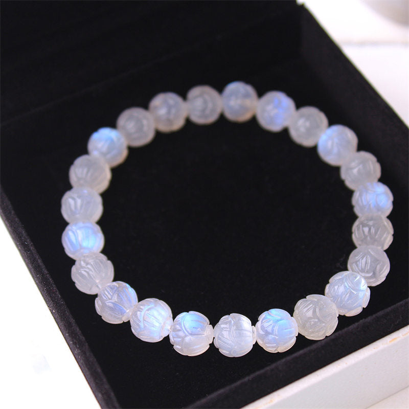 Natural Moonstone Lotus Love Bracelet - angled view in jewelry box, white edge detail
