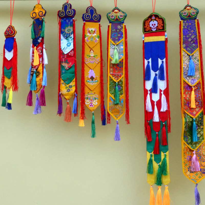 Lotus Auspicious Wall Art – Seven ceremonial banners with skull motif and tassels, Zen decor
