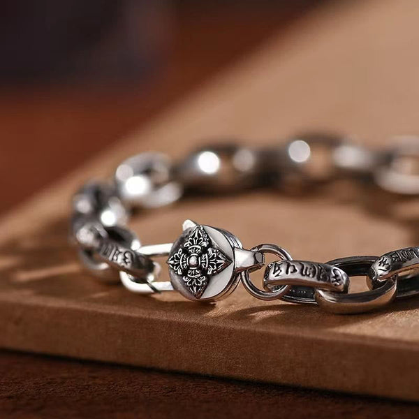 Double Dorje Wisdom Bracelet - Diamond charm with mandala engraving on wooden surface, artisan cuff