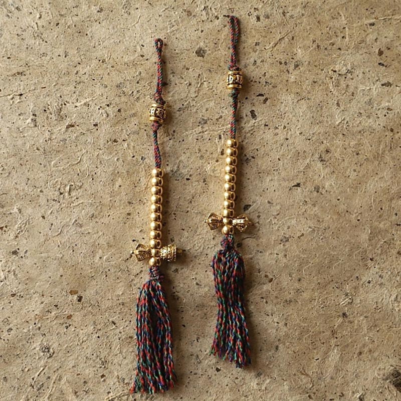 108 Bodhi Seed Mala Bracelet – Two gold vajra tassel counters with braided cords, mala accessories