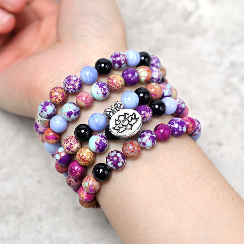 Purple Miano Real Stone Lotus Mala – multi-wrap bracelet on wrist with lotus charm, mindfulness