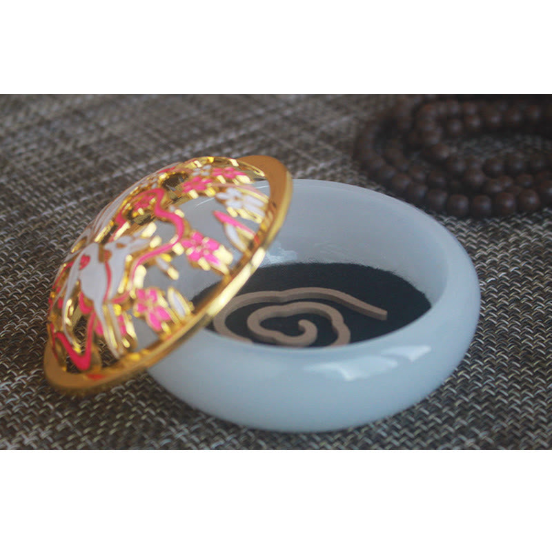 White Nine-Tailed Fox Incense Burner - Open lid revealing spiral incense coil inside, liuli censer