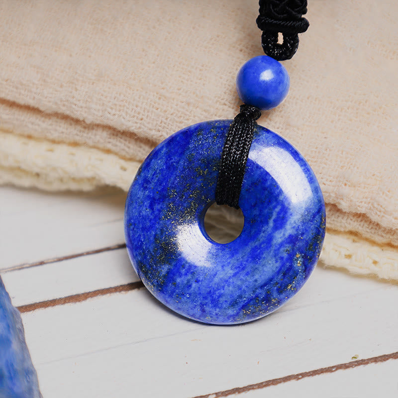Lucky Coin Pendant Healing Crystal Gemstone Necklace – Blue lapis lazuli bi disc necklace worn casually over white shirt