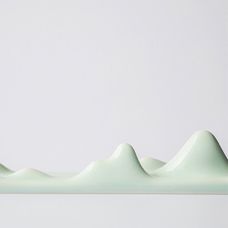 Mountain Cloud Incense Holder – Glossy mint-green ceramic peaks, refined