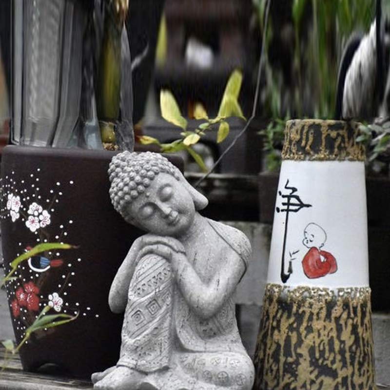 Tibetan Meditation Buddha Resin Decoration – resting Buddha near water fountain with plum blossom pottery, peaceful courtyard accent