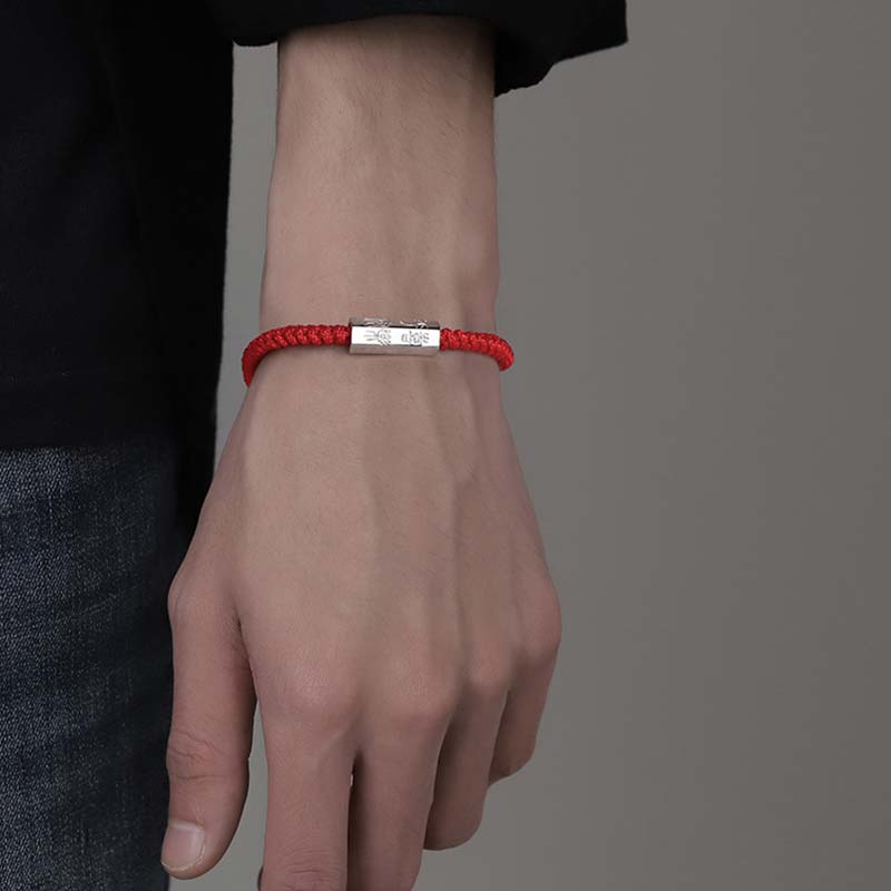 925 Sterling Silver Letter Blessing String Bracelet – Worn on wrist with black sleeve showing red cord and silver engraved 520 love number charm