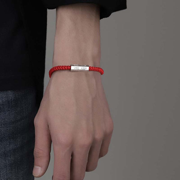 925 Sterling Silver Letter Blessing String Bracelet – Worn on wrist with black sleeve showing red cord and silver engraved 520 love number charm