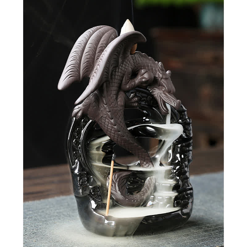 Ceramic Dragon Incense Burner – coiled dragon with dense smoke cascade pooling at dark base