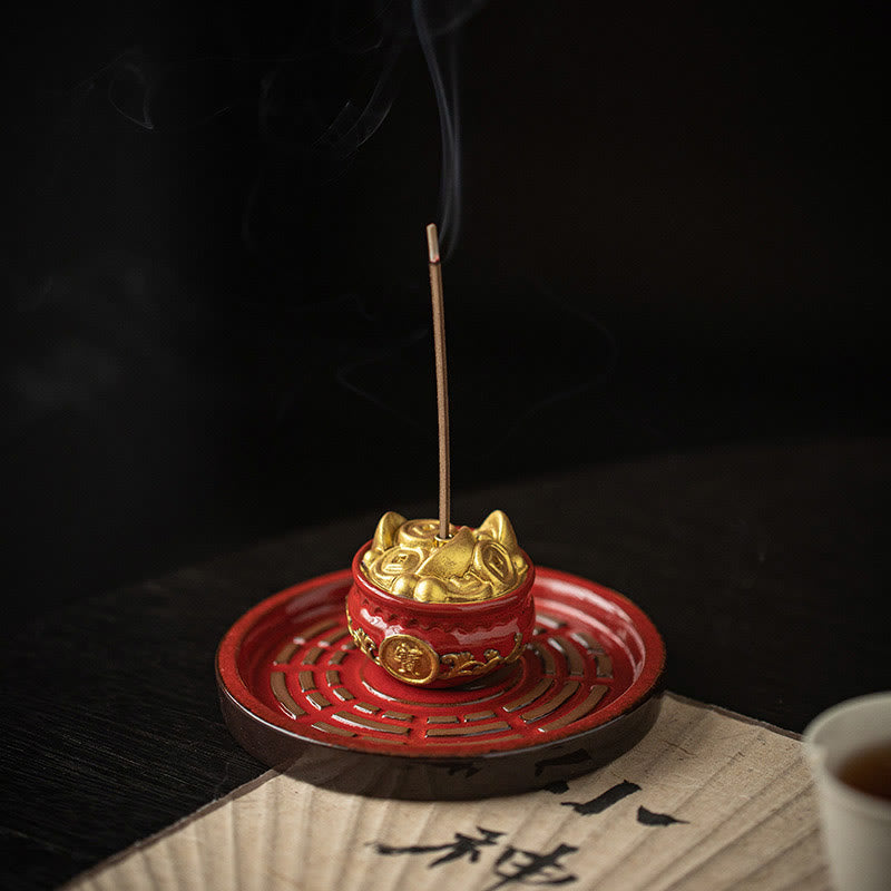 Red Bagua Incense Burner – Gold money toad on red ceramic base with bagua cutouts, scholarly background