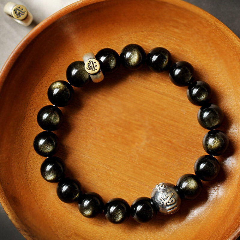 Zodiac Natal Buddha Obsidian Silver Bracelet - Obsidian beads with gold and silver mantra beads, wooden bowl display