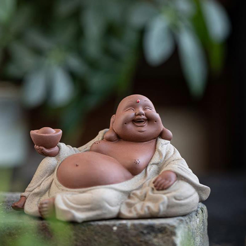 Laughing Buddha Clay Statue – jolly Buddha belly and smiling face close-up, prosperity figurine