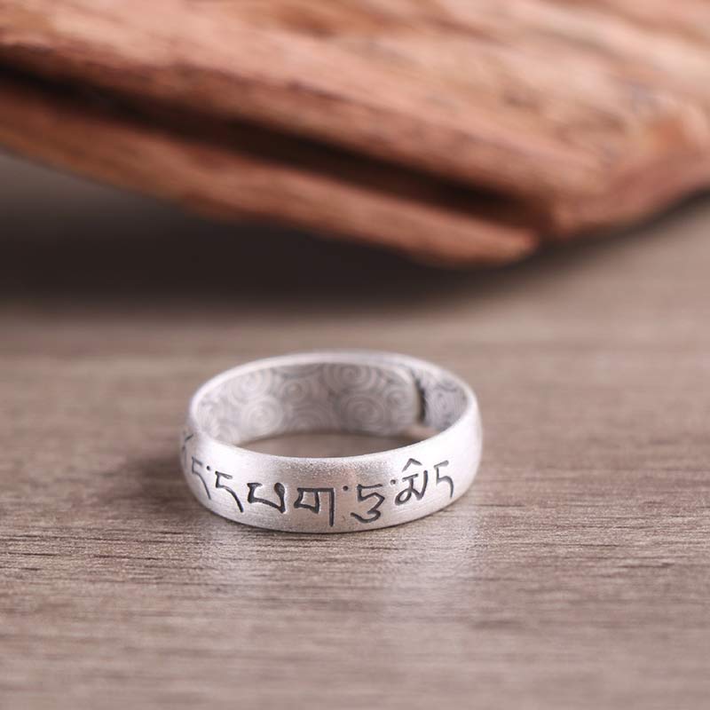 Sterling Silver Mantra Ring - standing on wood, interior engravings and 999 silver hallmark