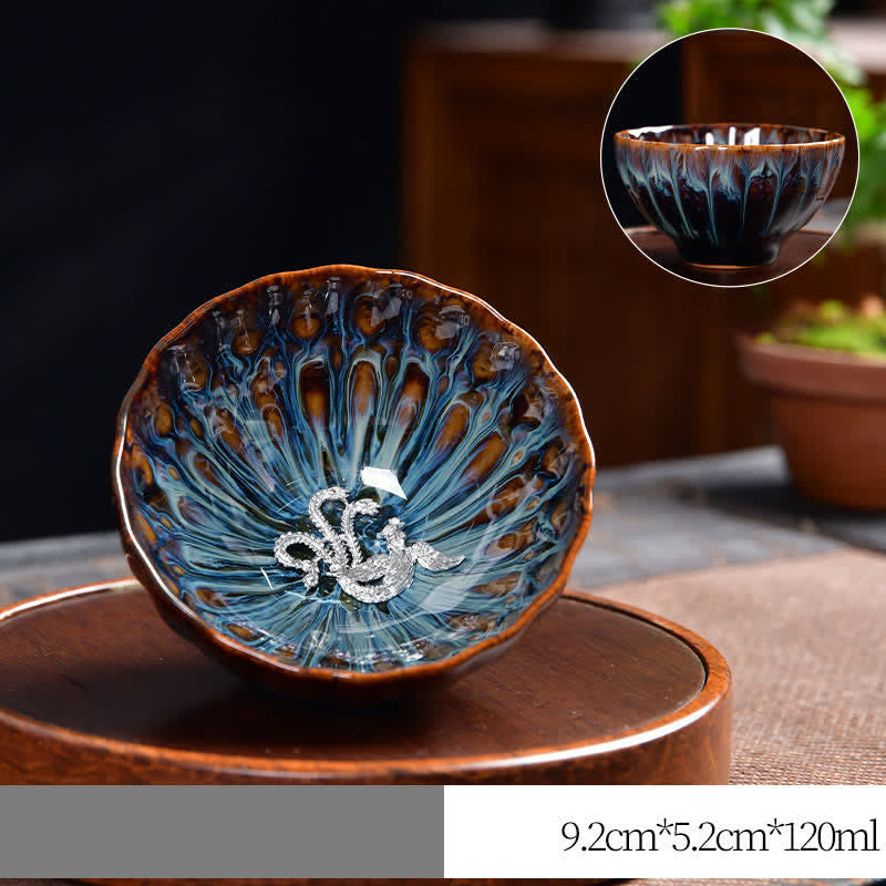 Lotus Peacock Dragon Phoenix Koi Fish Ceramic Teacup – natural lighting outdoor shot, ceramic art photography